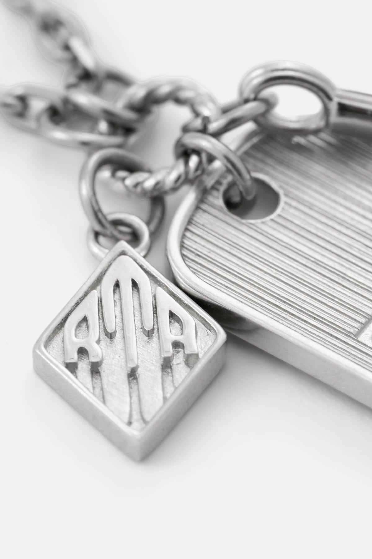 RION CHARM TAG NECKLACE | SILVER MULTI CHARM - Image 3
